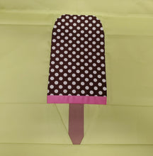 Load image into Gallery viewer, Ice Cream Bar 1 foundation paper pieced quilt block pattern by Penny Spool Quilts. Ice cream bar featuring pink bottom stripe and brown and white polka dot top, on light green background.