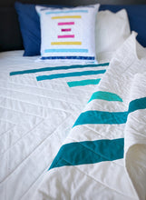 Load image into Gallery viewer, Raise the Bar quilt pattern by Penny Spool Quilts - Sample quilt in turquoise ombre and white, and sample pillow wit multicoloured stripes