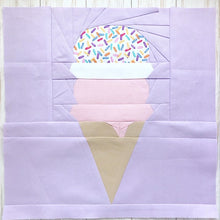 Load image into Gallery viewer, Ice Cream Cone quilt block pattern by Penny Spool Quilts. Part of the Ice Cream Sunday collection. Wafer cone with one scoop of light pink ice cream, whipped cream and one scoop of rainbow sprinkled ice cream, on lilac background.