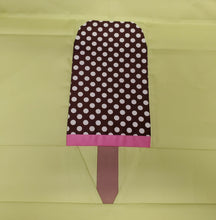 Load image into Gallery viewer, Ice Cream Bar 1 foundation paper pieced quilt block pattern by Penny Spool Quilts. Ice cream bar featuring pink bottom stripe and brown and white polka dot top, on light green background.

