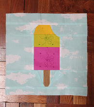 Load image into Gallery viewer, Popsicle 2 quilt block pattern by Penny Spool Quilts. Part of the Ice Cream Sunday collection. Tri-coloured popsicle with a bite taken out in top right corner, in yellow, green and pink Alison Glass print fabrics on light blue background.
